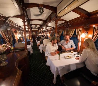 Dining carriage interior on a classic dinner train experience.