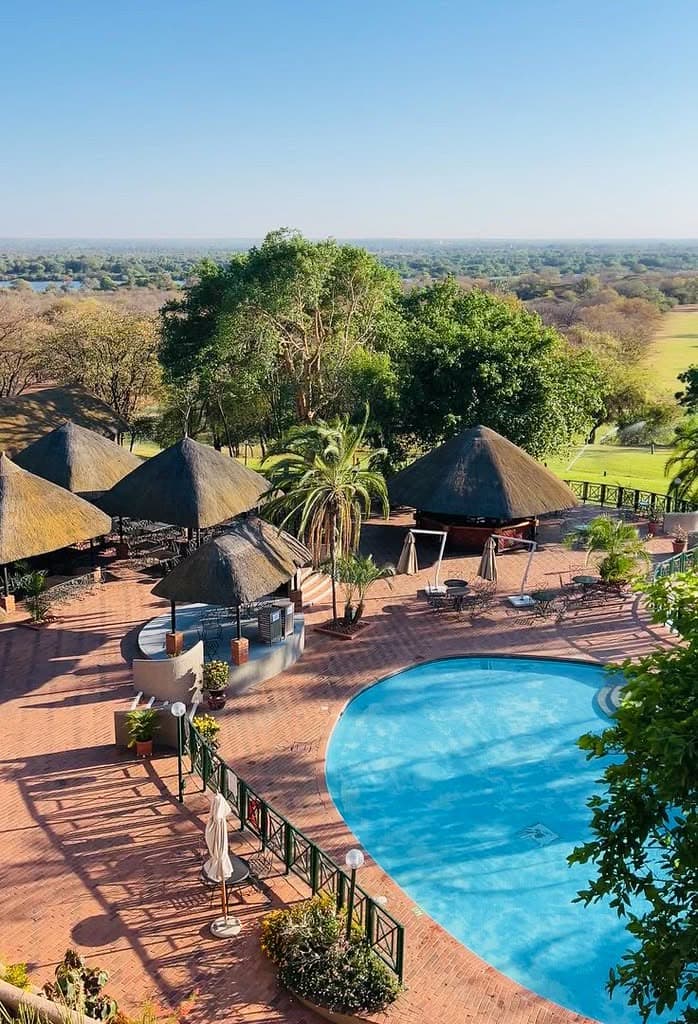 Sunlit boardroom set for a focused leadership meeting.