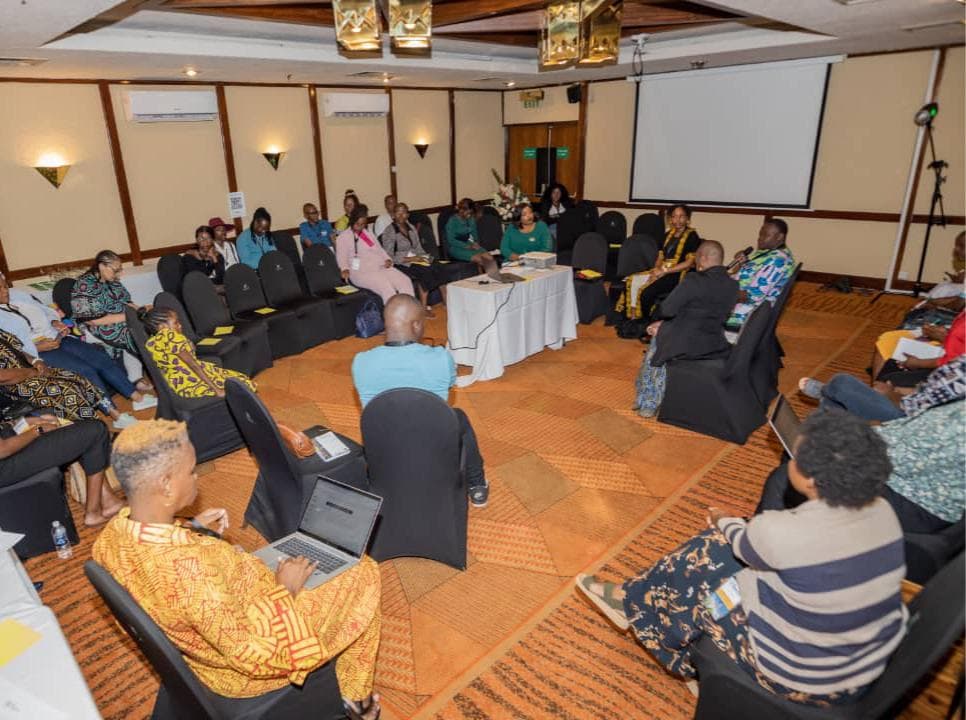 South Seventeen team guiding a seated discussion in a workshop setting.